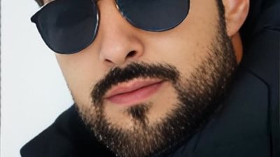 الاستاذة اللي لابسة طرحة